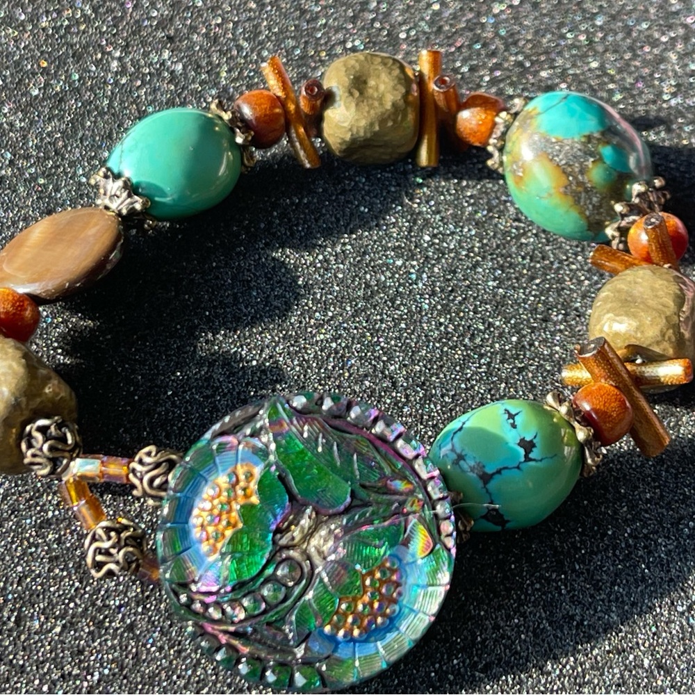 Handmade turquoise stone button beaded bracelet. Fits up to a 7 1/2” wrist.